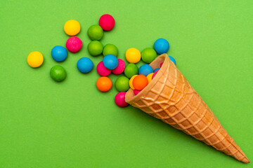 Waffle horn with many colorful candies