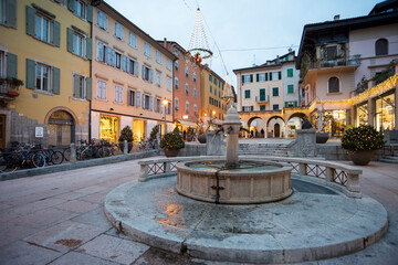 Fototapeta na wymiar Beautiful square in Riva del Garda, Trentino, Italy. Riva is a nice ancient town on Garda Lake, a popular touristic destination for people all over the world