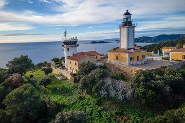 Fototapeta na wymiar Small island and lighthouse off the coast of Cap Taillat in the mediterranean