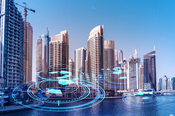 Naklejka premium Skyscrapers of Dubai business downtown. International hub of trading and financial services. Technology theme icons hologram, concept of big data. Double exposure. Dubai Canal waterfront.
