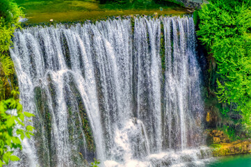 View over big waterfall of river Pliva in city of Jajce in Bosnia and Herzegovina. 