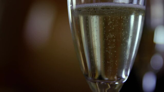 Champagne Bubbles in a Glass Closeup