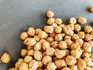 nuts. Uncooked dried chickpeas. Top view. Food background. Heap of legume chickpeas background 