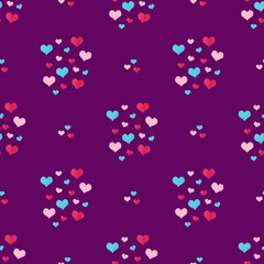 Watercolor pattern of blue, dark pink and light pink hearts on the purple background