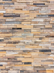 Texture of wooden planks - wall covering composed of multpiple small wooden planks - wood texture