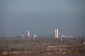 Industrial area of an ore or coal mine on a sunny day in the fall