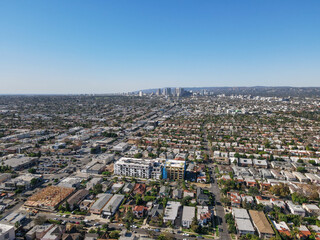 Fototapeta premium Aerial view above Mid-City neighborhood in Central Los Angeles, California. USA