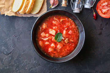 fresh borscht red tomato soup with meat first course yulion and vegetables ready to cook and eat on the table for healthy meal snack outdoor top view copy space for text food background rustic image