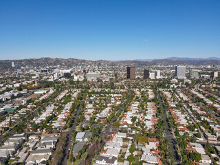 Fototapeta premium Aerial view above Mid-City neighborhood in Central Los Angeles, California. USA