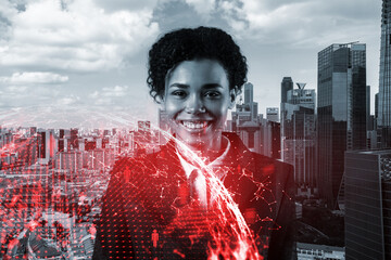 Smiling black woman HR director at international company is thinking about recruitment of highly qualified specialists. Women in business concept. Social media hologram icons over Singapore.