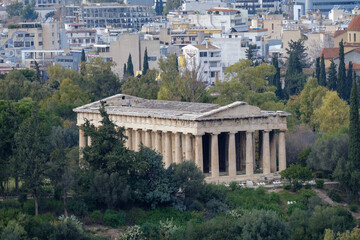 Athens - December 2019: view of Temple of Hephaestus with Athens in background