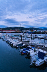 Fototapeta na wymiar Fishing port of Colindres at dusk, Colindres Municipality, Marismas de Santoña, Victoria y Joyel Natural Park, Cantabria, Spain, Europe