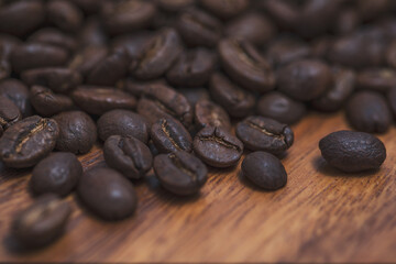 A background of scattered coffee beans.