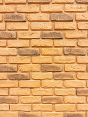 Texture of a wall made of rusty orange colored bricks