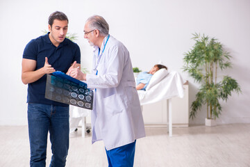 Young husband visiting sick wife in the clinic