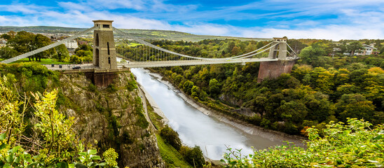 A panorama view of the Avon Gorge and the Clifton Suspension bridge that spans it from Sion Hill on a bright Autumn day