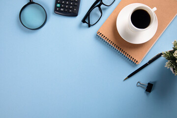 Office table with paper note and glasses