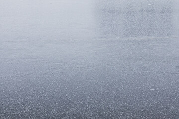 ice on a frozen pond - close up view, ice texture