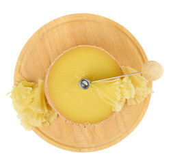 Head of Tete de Moine cheese on the Girolle isolated on a white background, shallow depth of sharpness