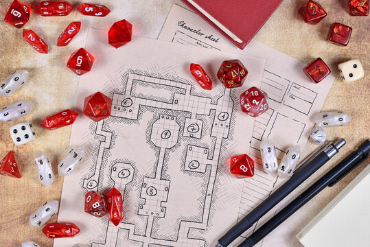 Roleplaying game dices on hand drawn dungeon adventure map. Concept for table top role playing games
