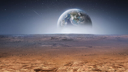 Earth planet in the sky over desert and stones. View on planet from Mars surface. Abstract sci-fi...