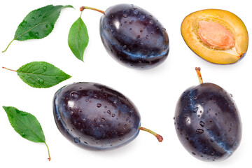 fresh plum fruit with green leaf and cut plum slices isolated on white background. Clipping path. top view