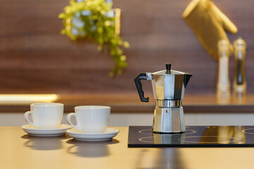 Objects on kitchen table in contemporary apartment