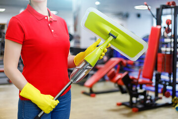 Concept of cleaning services of gyms and fitness centers.
