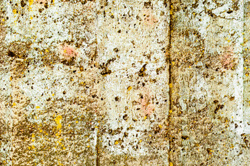 Texture of a concrete wall with cracks and scratches which can be used as a background