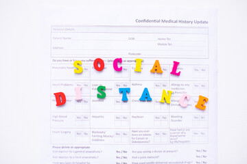Coronavirus and social distancing. COVID-19 Social distancing. Social distancing made from wood letters, blocks. Stay at home concept.
