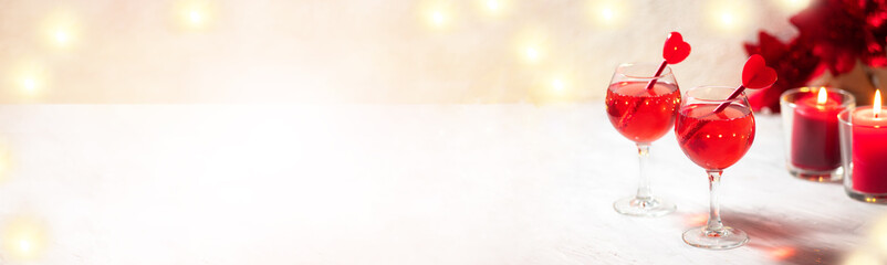 Red mimosa cranberries drink champagne glasses valentine's day romantic table banner