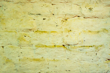 Texture of a brick wall with cracks and scratches which can be used as a background