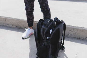 Backpack with sports clothing and accessories.