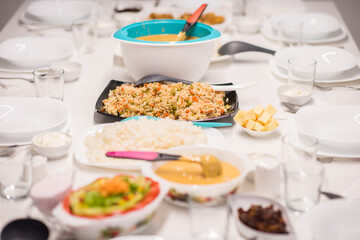Beautiful ready lunch on dining table in modern home