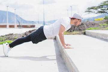 Young man exercising in the park.