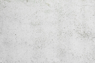 Texture of a concrete wall with cracks and scratches which can be used as a background