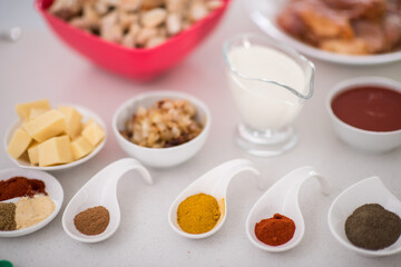 Preparing food in modern white kitchen