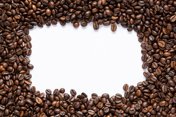 brown roasted coffee beans frame on white background