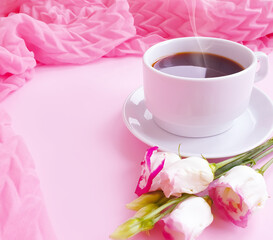 cup of coffee flower rose on a colored background