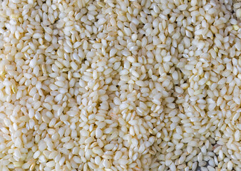white rice raw Italian rice grains as background