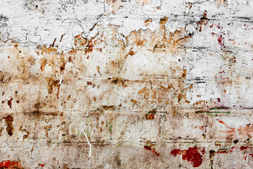 Texture of a brick wall with cracks and scratches which can be used as a background