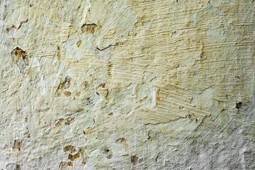 Texture of a concrete wall with cracks and scratches which can be used as a background