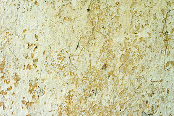 Texture of a concrete wall with cracks and scratches which can be used as a background