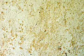 Texture of a concrete wall with cracks and scratches which can be used as a background