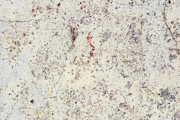 Texture of a concrete wall with cracks and scratches which can be used as a background