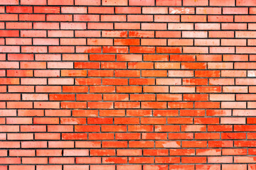 Texture of a brick wall with cracks and scratches which can be used as a background