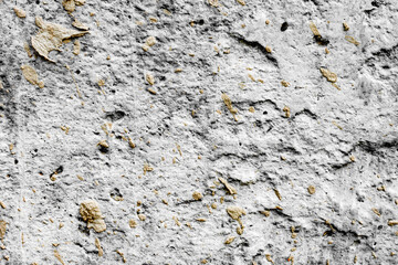 Texture of a concrete wall with cracks and scratches which can be used as a background