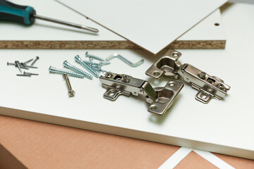 spare parts for furniture assembly top view. furniture fittings background