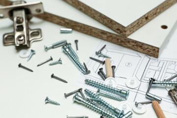 spare parts for furniture assembly top view. furniture fittings background