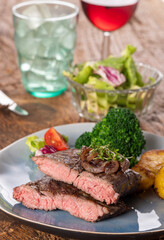 halves of a steak on a plate